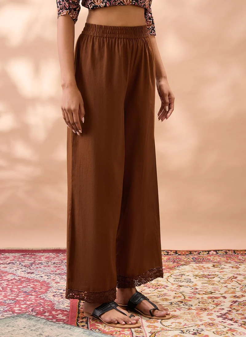 globus  Globus Women Brown Solid High Rise Lace Detail Hem Straight Fit Wide Leg Ethnic Pants for Women | Best Price UAE